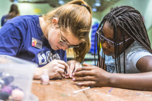 Girls working at Extended School Enrichment (ESE) - a before and after school program