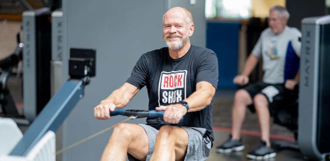 MCC Member utilizes a rowing machine in the fitness center.