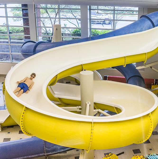 Kid on a slide at Monon Community Center