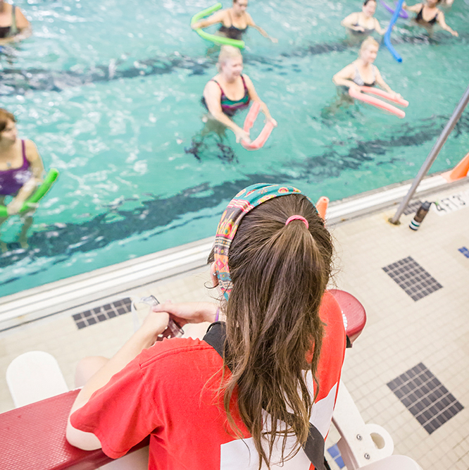 Aqua fitness class swimming at Monon Community Center