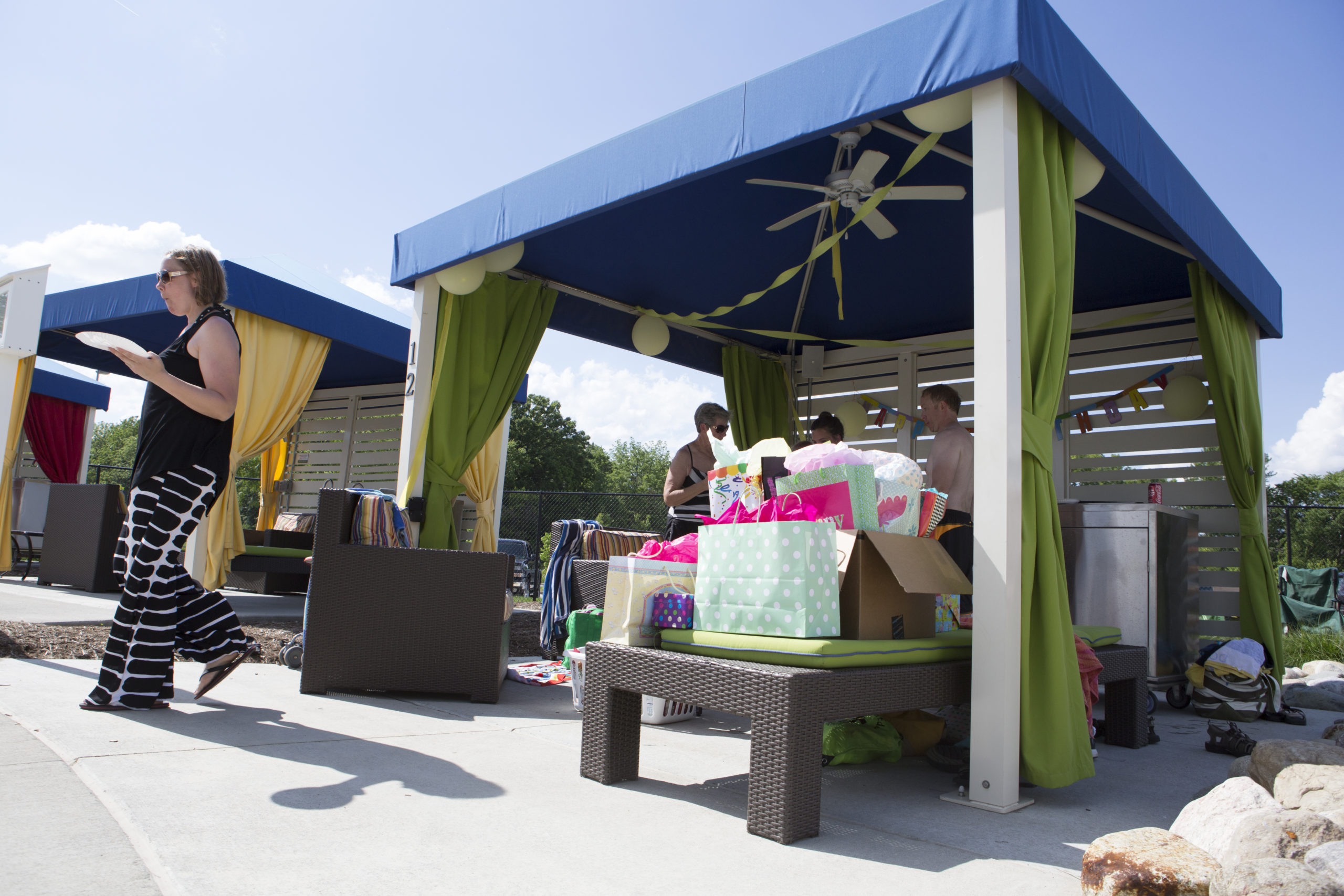 Birthday party with gifts and friends at one of the Waterpark cabanas.