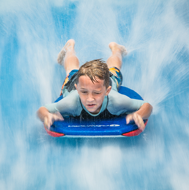 young boy on the FlowRider®