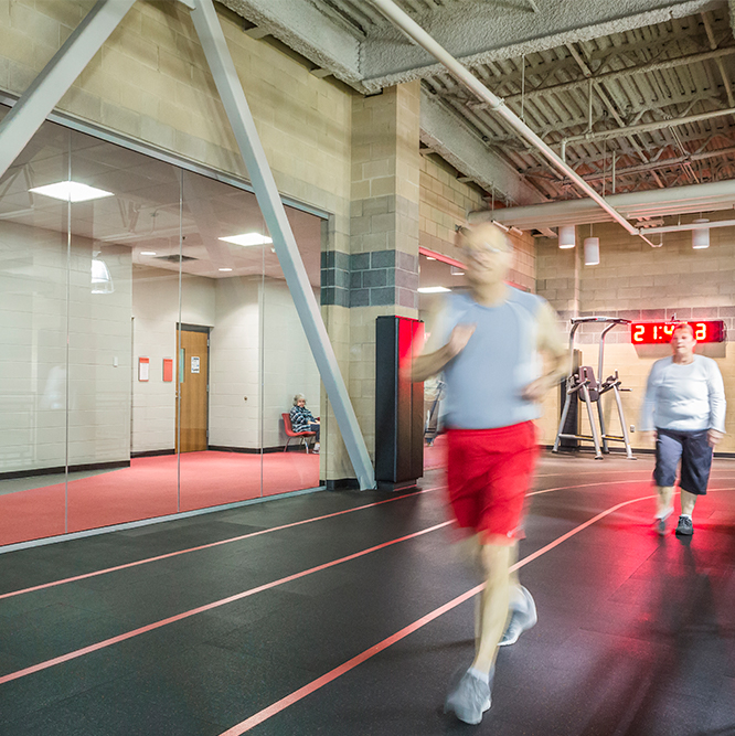 Man running on the Monon Community Center Indoor Track