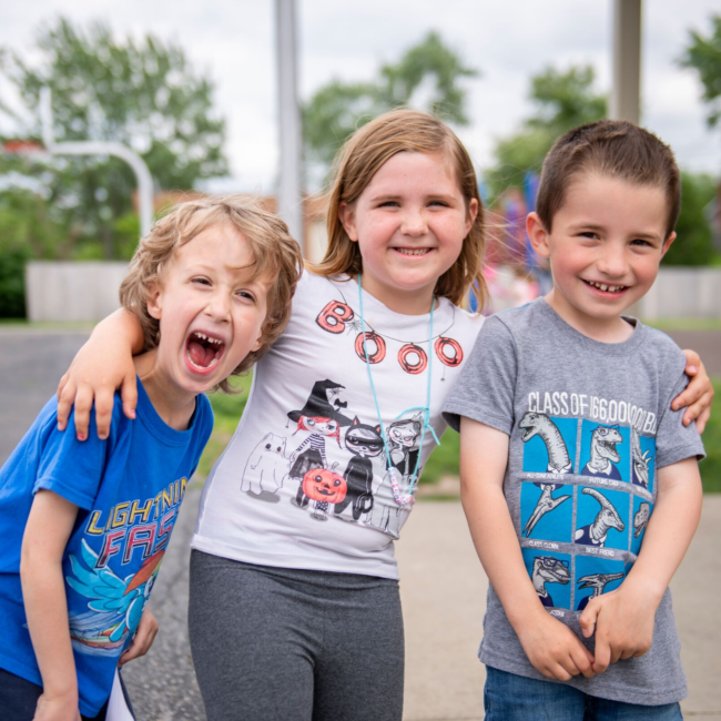 Kids smiling in a great outdoors summer camp