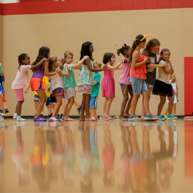 Kids playing at a Play On summer camp