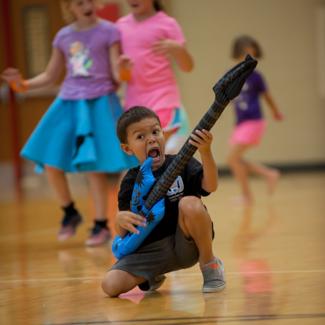 Kids playing at a Play On summer camp