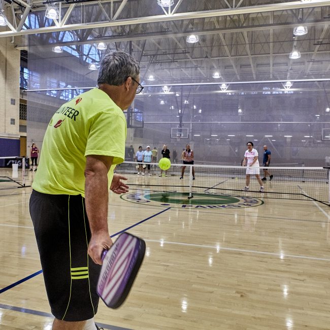 Volunteer playing Pickleball at the Monon Community Center