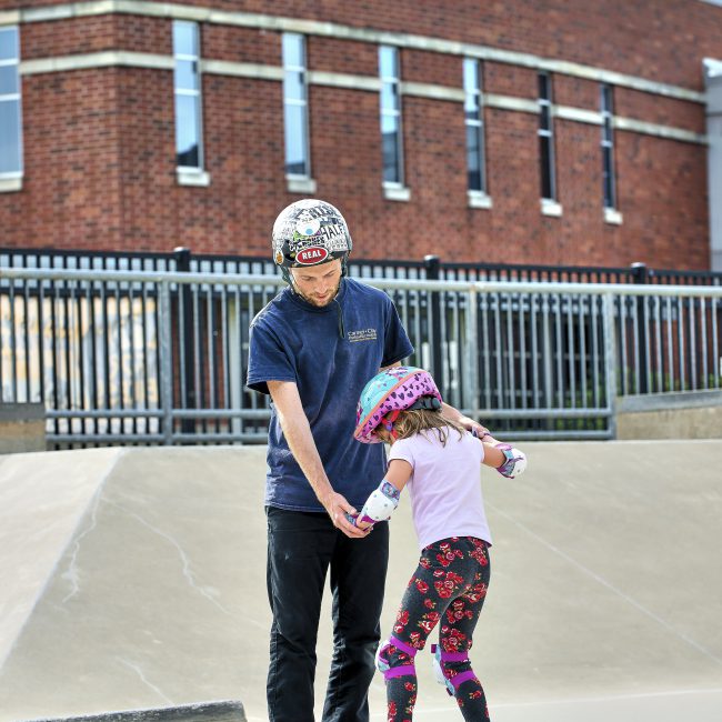 Kid skateboarding at the Skatepark at the Monon Community Center (MCC)