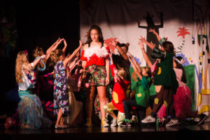 Summer Campers acting on stage