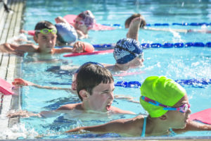 Kids swimming in the pool