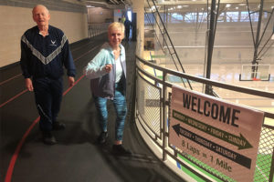 Diana and Nolan on the indoor track at the Monon Community Center.