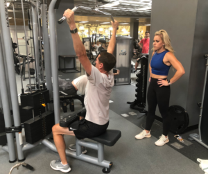 The Fischers weight lifting at the Monon Community Center