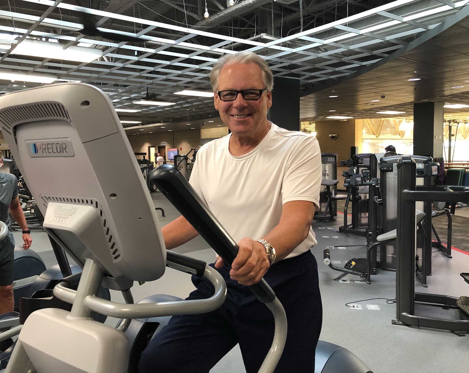 Dan Gooliak working out on elliptical at MCC Fitness Center