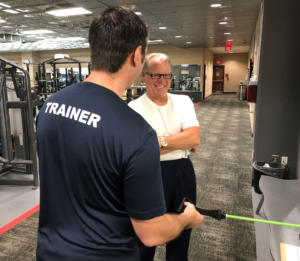 Dan Gooliak talking with personal trainer Nate Thomas