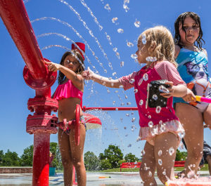 Children playing at Inlow Park splash pad