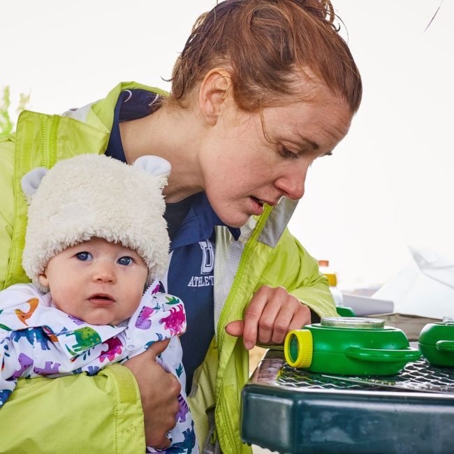 Mother and daughter working outside