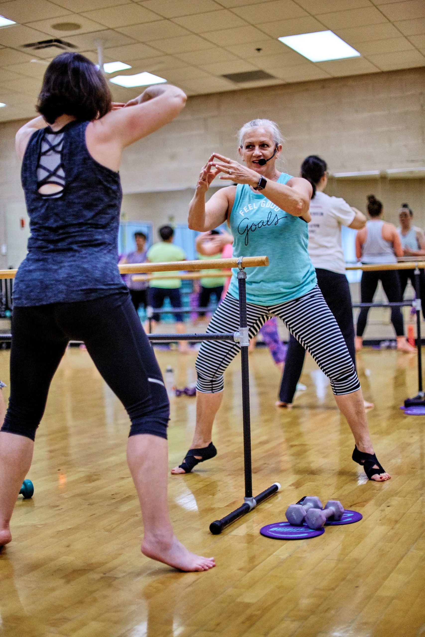 Tammy Roberts instructing a barre class