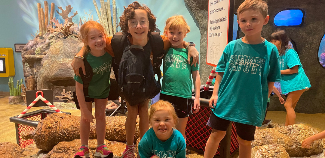 Campers pose during a field trip