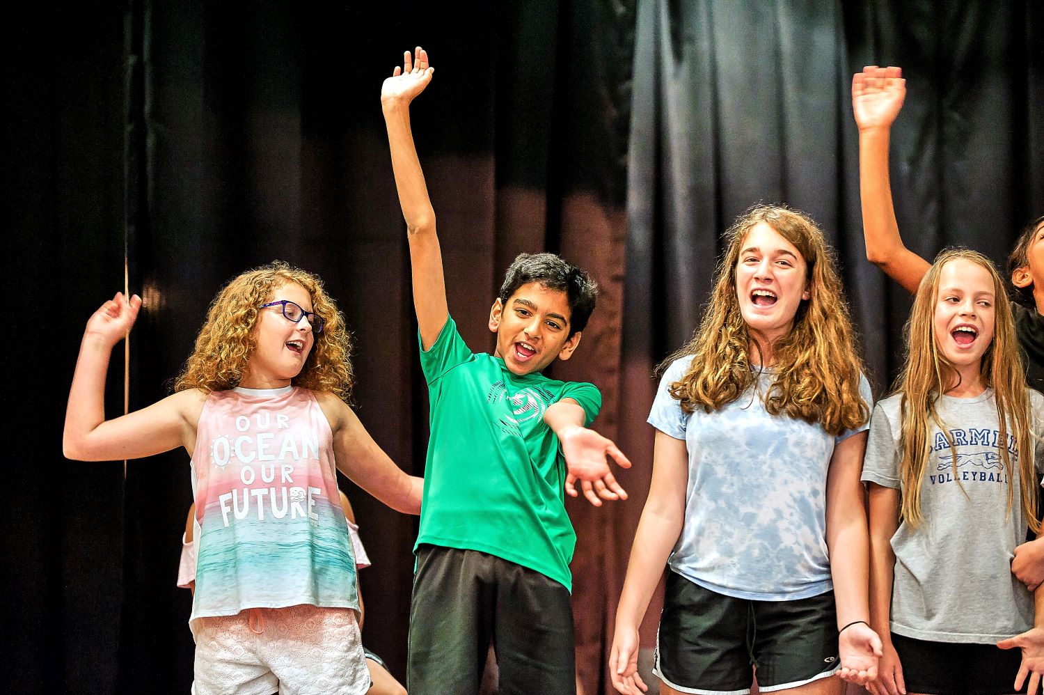 Kids in a play singing and acting