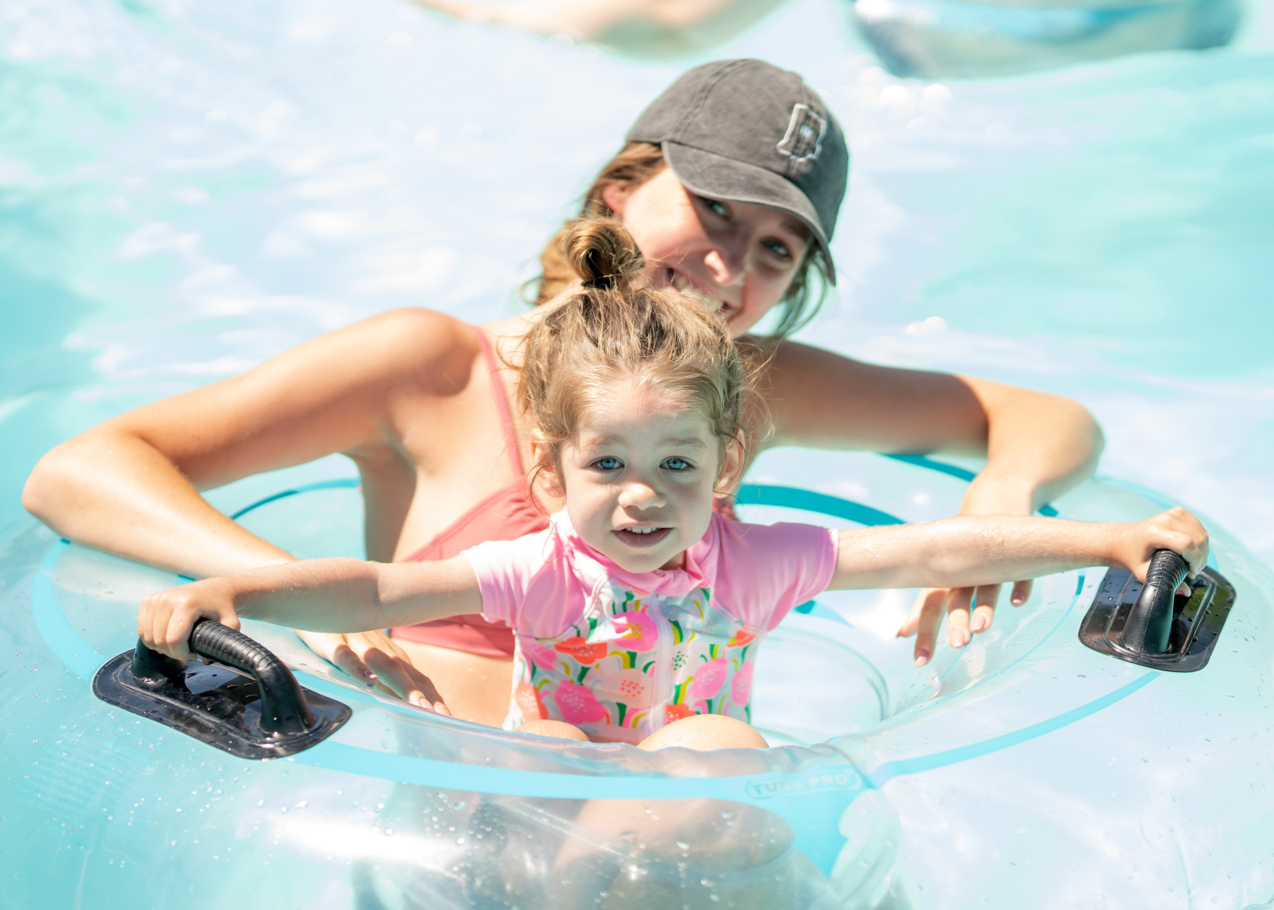 Mother with Child in lazy river at The Waterpark
