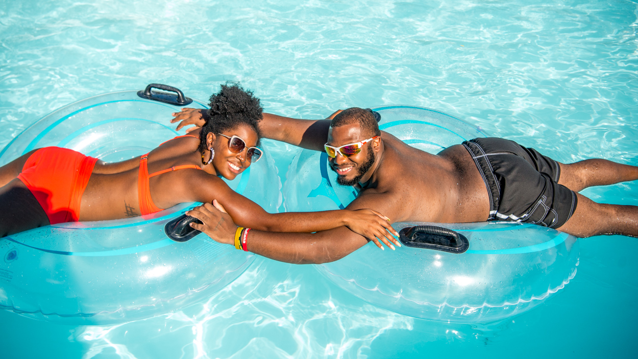 Adults floating on lazy river