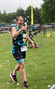 Janine Beazley mid-race during an iron man race in Dublin , Ireland taking a sip of water.