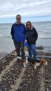 Tina K and Husband Mark with dog sheldon at the beach