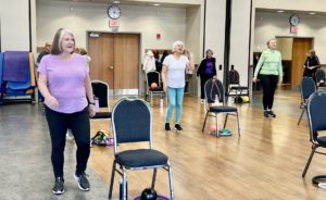 Linda participating in silver sneakers class at the MCC.