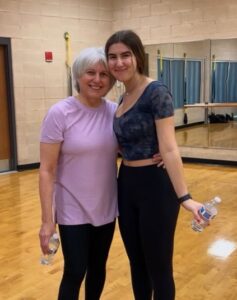 MCC Member Rose P. does workout class with her granddaughter.