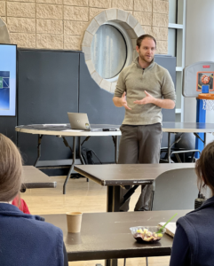 Divergent wellness presenter at a lunch n' learn.