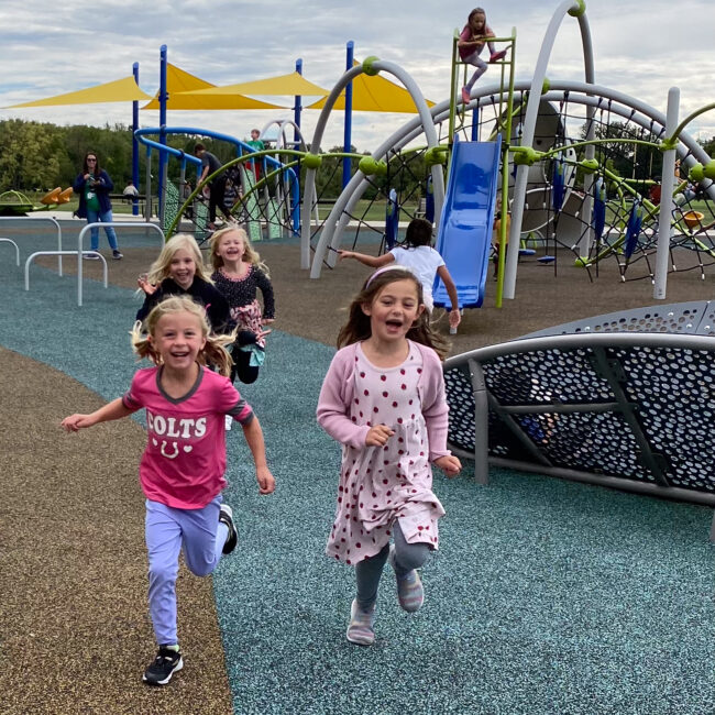 ESE participants run across the playground after school.