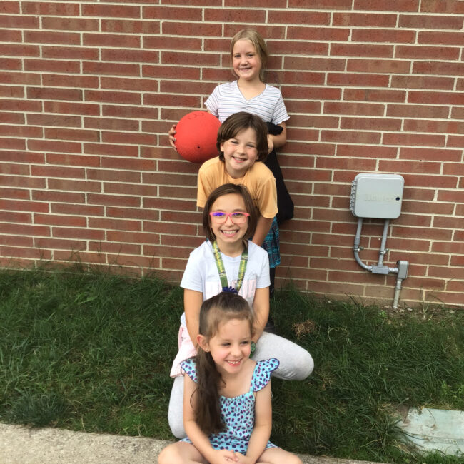 Children pose for a photo at ESE.