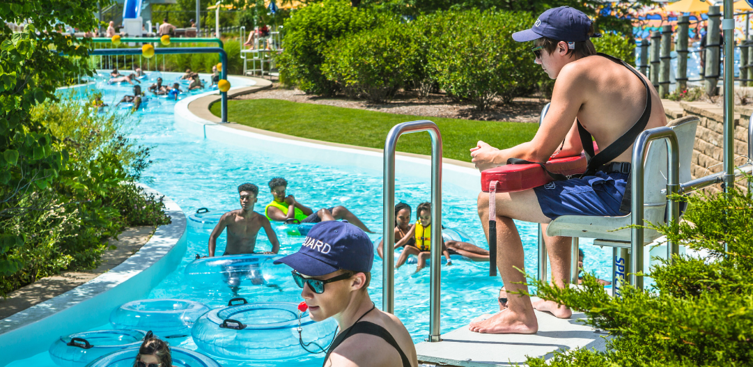 Lifeguards watch over guests who are floating and swimming in the lazy river at The Waterpark.