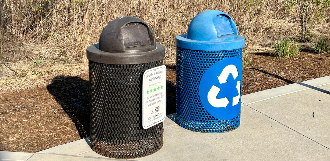 Trash and recycling bins at the trailhead on the Monon by the Monon Community Center.