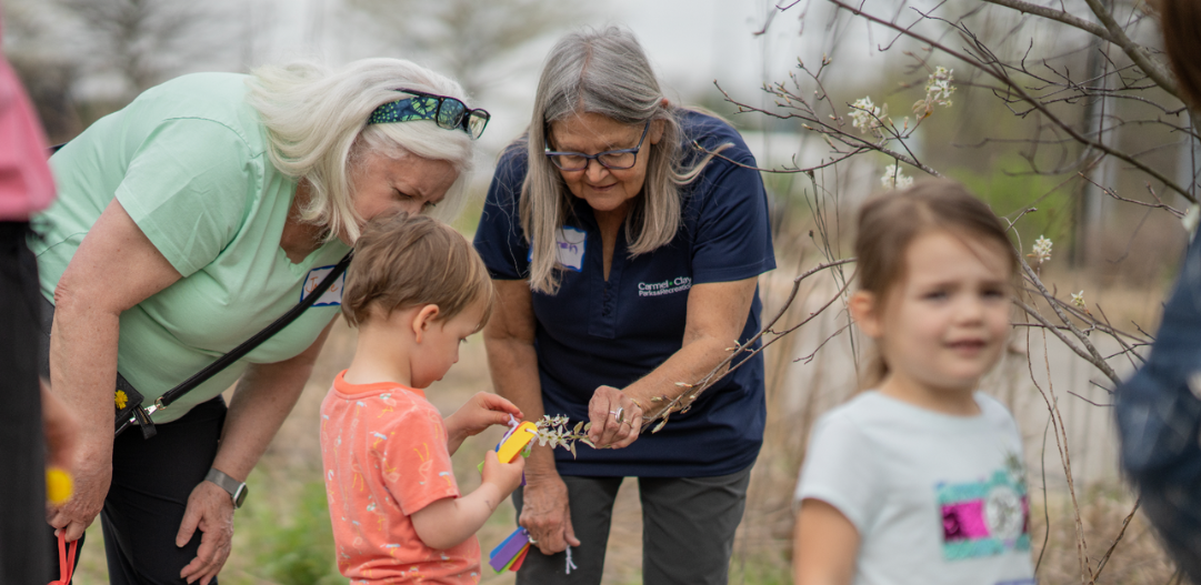CCPR resident naturalist Karen works with children identifying wildflowers along some trails during the Knee High Naturalist program.