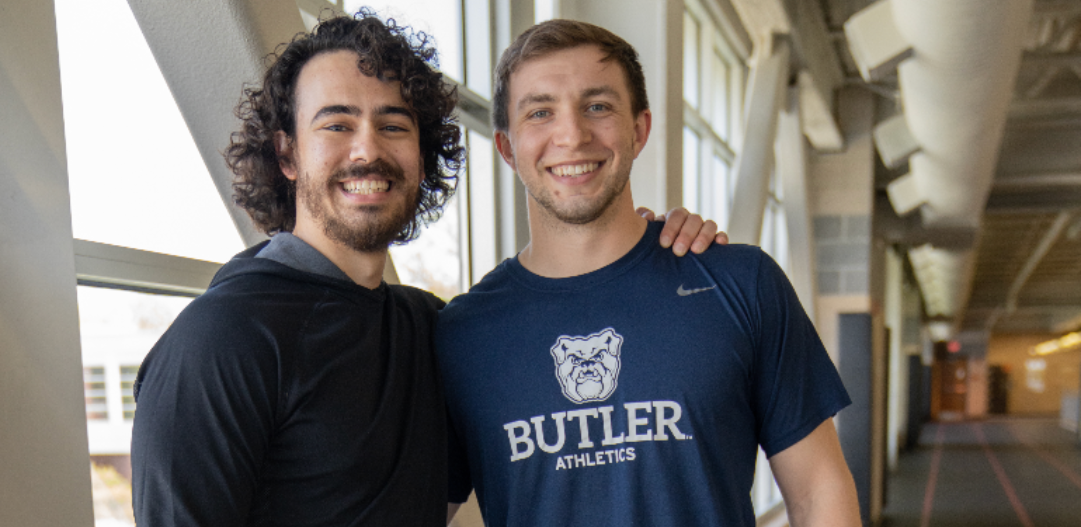 MCC members Matt & Same pose together on the indoor track.