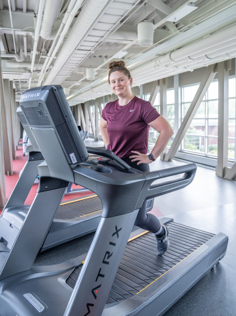 MCC Member Cherish H. walking on a treadmill in the Oasis at the MCC